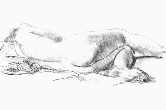 A charcoal drawing of a nude lady laying down on a bed.
Featuring black, grey and white.
A museum-quality fine art print with a lightly textured, matt finish, using giclée printing techniques that won't fade.
