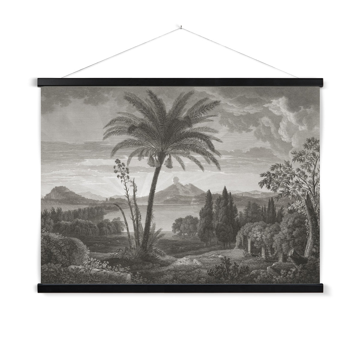 A ready to hang, vintage etching of palm trees and foliage with mountains and a volcano in the distance.
A premium print that comes ready to hang. Our slimline wooden poster hangers come with a discrete magnetic fastening to keep your prints perfectly secure. Hand-crafted from beautiful, solid wood, our picture hangers are ideal for displaying prints using a simple, contemporary design.
The Mt Etna print features shades of grey, and black.