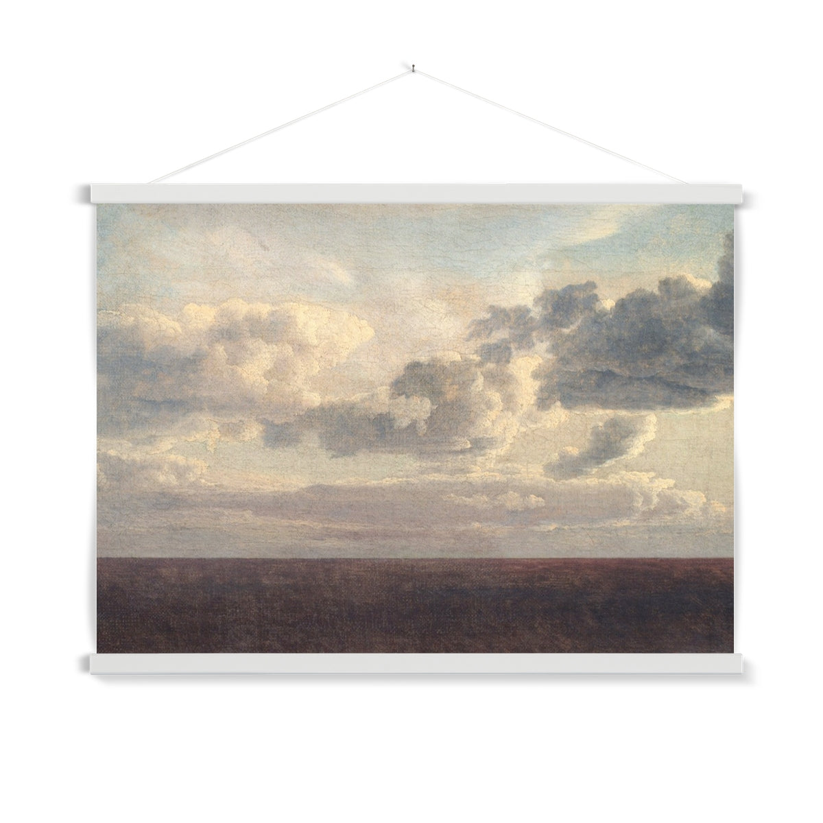 A ready to hang, vintage painting of the ocean. This ambient, vintage depiction of a peaceful, cloudy sky and flat ocean in deep indigo will infuse any space with textured patina and warmth.
A premium print that comes ready to hang. Our slimline wooden poster hangers come with a discrete magnetic fastening to keep your prints perfectly secure. Hand-crafted from beautiful, solid wood, our picture hangers are ideal for displaying prints using a simple, contemporary design.
The Fading View print feature