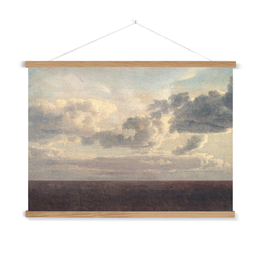 A ready to hang, vintage painting of the ocean. This ambient, vintage depiction of a peaceful, cloudy sky and flat ocean in deep indigo will infuse any space with textured patina and warmth.&nbsp;

A premium print that comes ready to hang. Our slimline wooden poster hangers come with a discrete magnetic fastening to keep your prints perfectly secure. Hand-crafted from beautiful, solid wood, our picture hangers are ideal for displaying prints using a simple, contemporary design.
The Fading View print feature