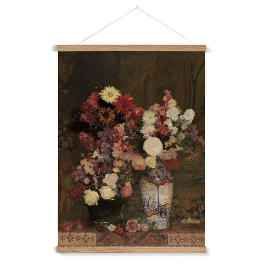 An elegant painting of a richly detailed arrangement of multi-colored flowers in an oriental vase,&nbsp;with a wooden hanger included.&nbsp;A perfect addition to the maximalist home.

A premium print + slimline wooden poster hanger with a discrete magnetic fastening to keep your prints perfectly secure. Hand-crafted from beautiful, solid wood, our picture hangers are ideal for displaying prints using a simple, contemporary design. When you want to update your style, simply change the print.
The Oriental Vas