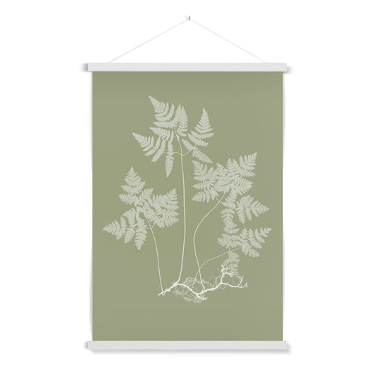 A delicate botanical study of a fern with a wooden hanger included. Part of a pair.

A premium print + slimline wooden poster hanger with a discrete magnetic fastening to keep your prints perfectly secure. Hand-crafted from beautiful, solid wood, our picture hangers are ideal for displaying prints using a simple, contemporary design. When you want to update your style, simply change the print.
The Eucalyptus Fern 1 print features green and ivory.
+ Free International Shipping.