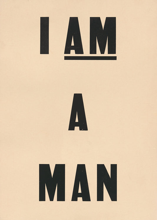 A vintage poster with the words 'I am a Man'.