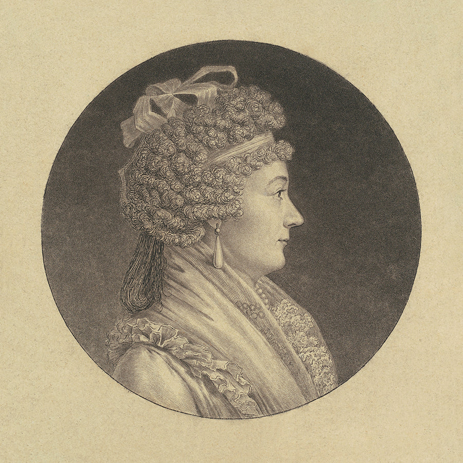 A vintage portrait of a woman in profile, in a circular frame. This is part of a 9 print series.