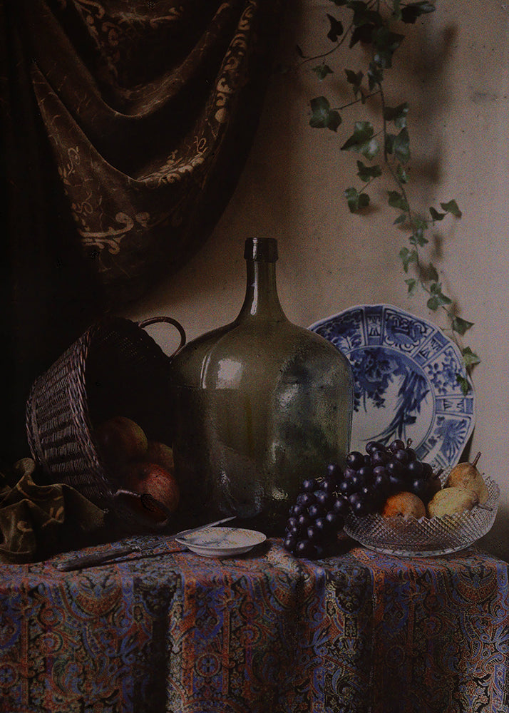 A muted and moody evocative kitchen-inspired still life vintage photograph. Rich, atmospheric tones create an intimate mood that draws you in, its aged patina adds character and warmth.

Featuring muted black, brown, blue, green, beige, yellow, red, purple and ivory.
A museum-quality fine art print with a textured, matt finish, using giclée printing techniques that won't fade.