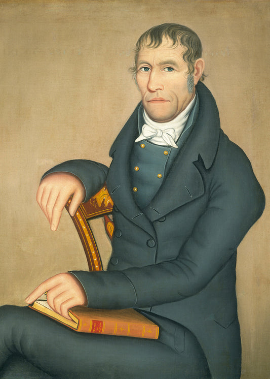 A vintage portrait of a seated man with a book.&nbsp;

Featuring shades of steel blue, grey, white, yellow, gold, tan, blush, beige and soft caramels.
A museum-quality fine art print with a lightly textured, matt finish, using giclée printing techniques that won't fade.