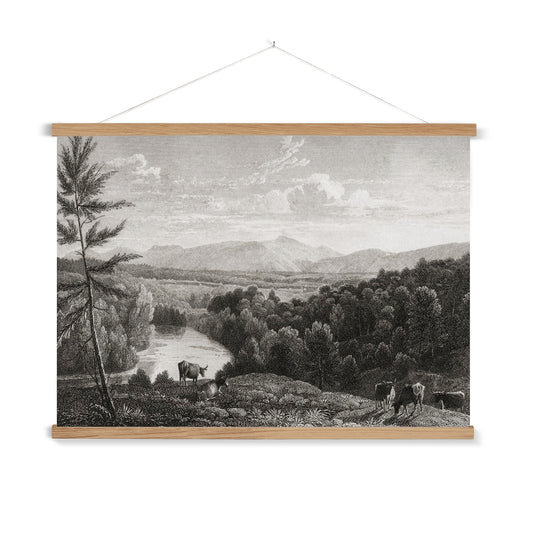 A vintage etching of the Catskills Mountain Range, with a wooden hanger included. The foreground features grazing livestock, while the river and surrounding forest provide a beautiful backdrop to the Mountains.&nbsp;

A premium print + slimline wooden poster hanger with a discrete magnetic fastening to keep your prints perfectly secure. Hand-crafted from beautiful, solid wood, our picture hangers are ideal for displaying prints using a simple, contemporary design. When you want to update your style, simply 