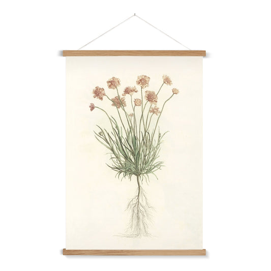 A ready to hang, pretty botanical print with delicate pastel flowers complete with roots.

A premium print that comes ready to hang. Our slimline wooden poster hangers come with a discrete magnetic fastening to keep your prints perfectly secure. Hand-crafted from beautiful, solid wood, our picture hangers are ideal for displaying prints using a simple, contemporary design.
The Peach Bloom print features shades of green, apricot, blush, creamy beige and tan.